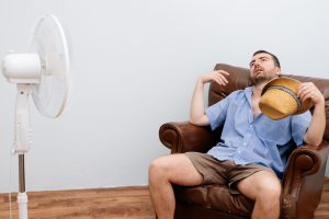 overheated-person-with-a-fan